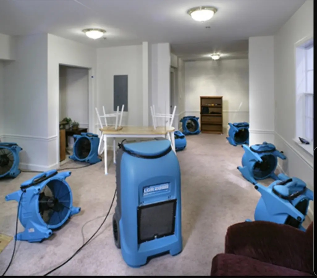 Air movers and dehumidifier setup for Water Damage Restoration in St. Albans